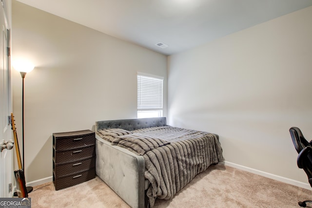 516 Grand Magnolia St, Jackson, GA 30233 - bedroom with light colored carpet and baseboards