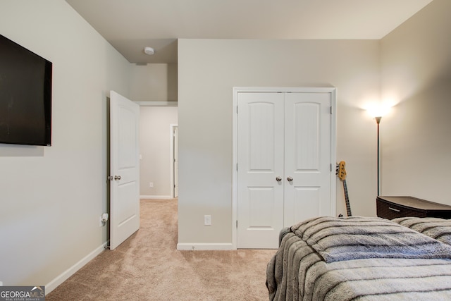 516 Grand Magnolia St, Jackson, GA 30233 - bedroom featuring light carpet, baseboards, and a closet
