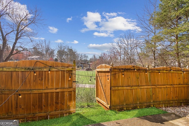 view of yard with fence