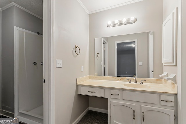 bathroom featuring vanity, baseboards, a stall shower, and ornamental molding