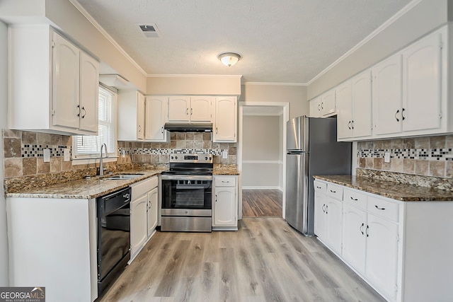 kitchen with crown molding, under cabinet range hood, white cabinets, stainless steel appliances, and a sink