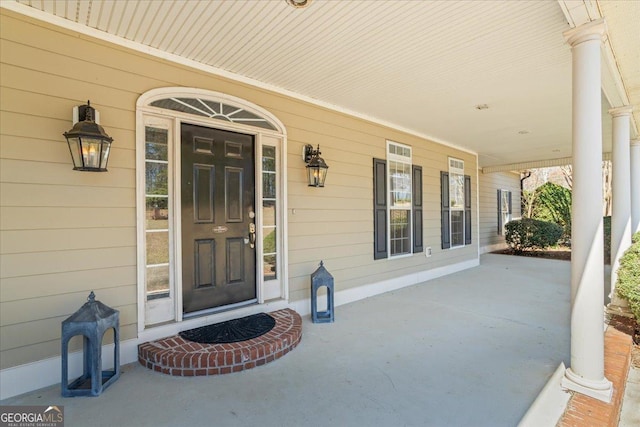 property entrance featuring covered porch