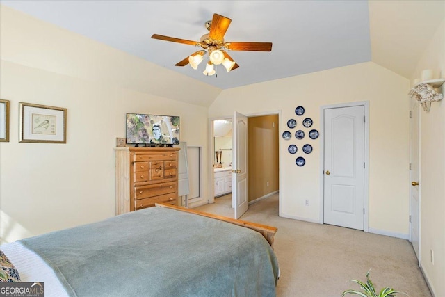 bedroom featuring light colored carpet, ceiling fan, baseboards, and vaulted ceiling