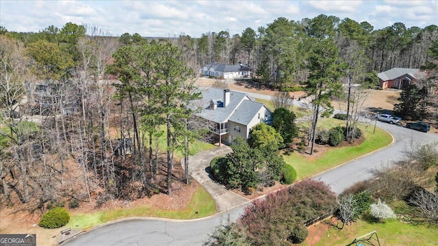 drone / aerial view with a forest view