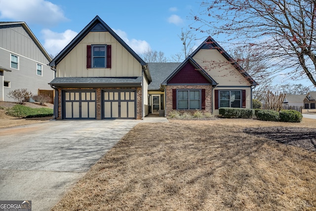 craftsman house featuring driveway, an attached garage, a shingled roof, board and batten siding, and brick siding