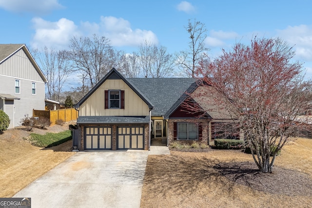 craftsman-style house with driveway, board and batten siding, roof with shingles, an attached garage, and brick siding