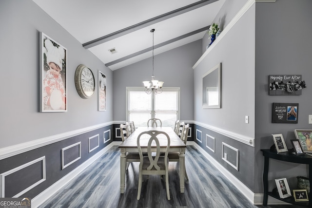 dining room featuring visible vents, a notable chandelier, dark wood finished floors, wainscoting, and vaulted ceiling with beams