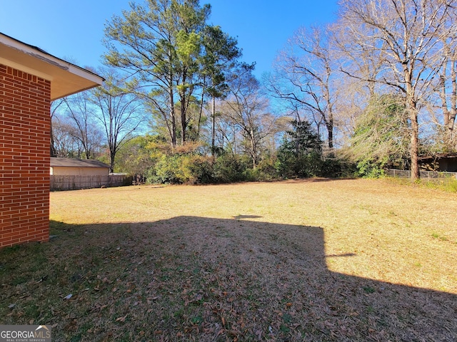 view of yard featuring fence