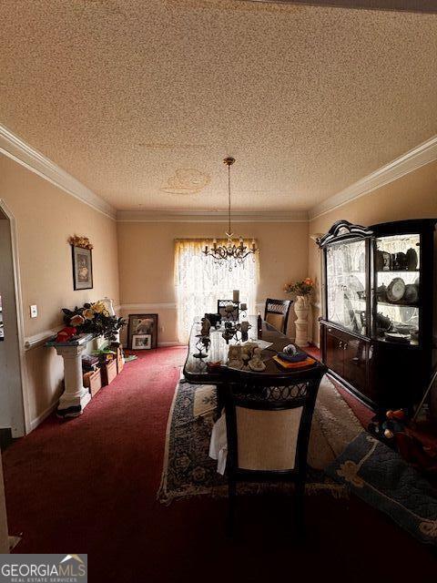 carpeted dining space featuring a textured ceiling, an inviting chandelier, and ornamental molding