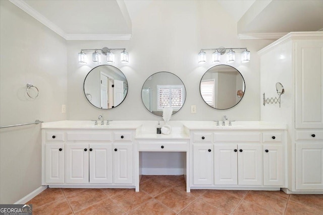 full bathroom featuring vanity, baseboards, ornamental molding, and tile patterned flooring