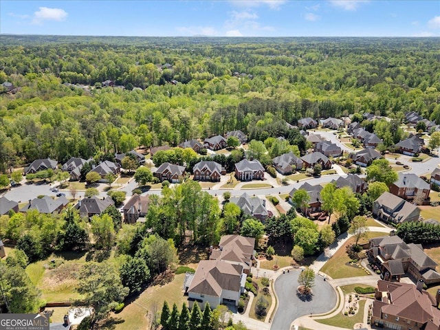 bird's eye view with a view of trees and a residential view