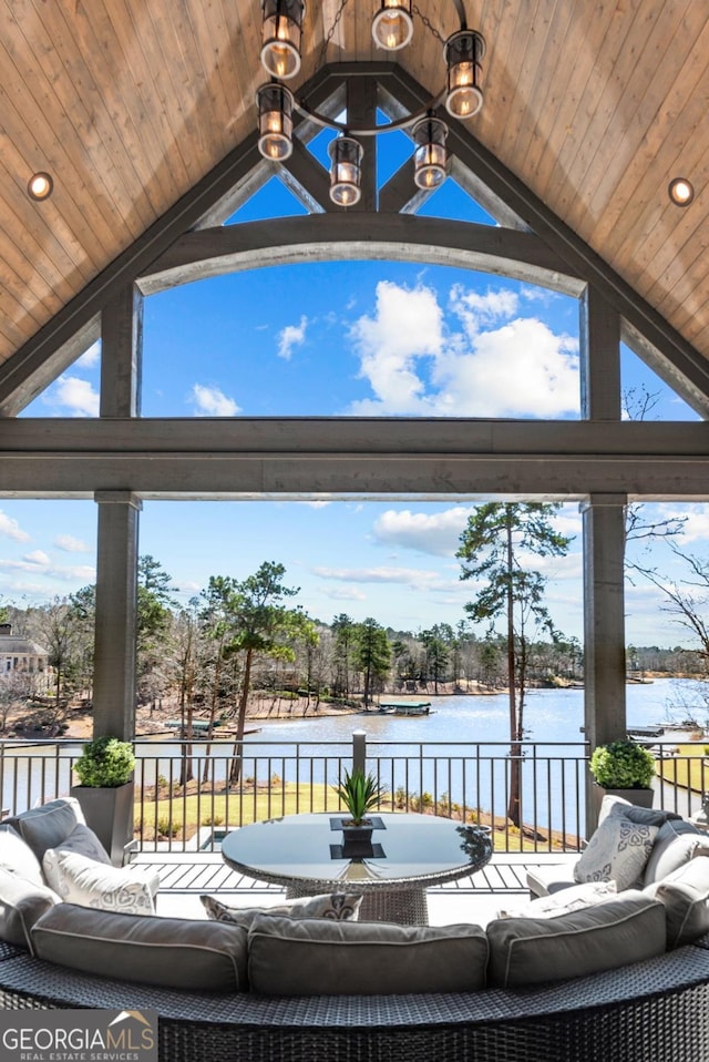 view of patio / terrace with outdoor lounge area and a water view