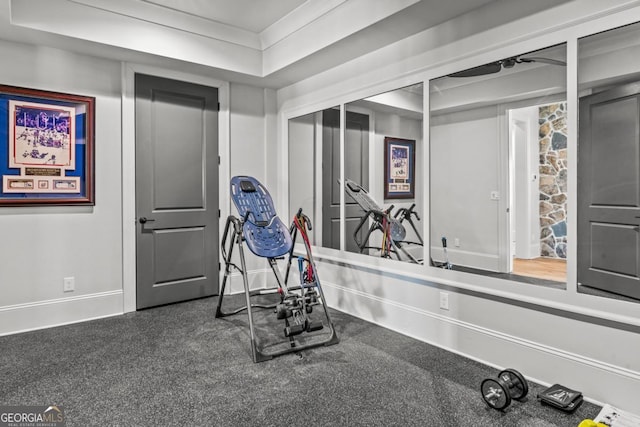 exercise room with baseboards