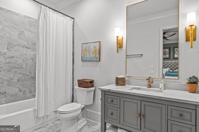 bathroom featuring toilet, marble finish floor, shower / tub combo, baseboards, and vanity