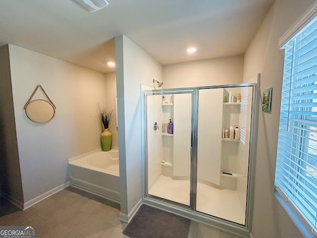 bathroom featuring baseboards, visible vents, recessed lighting, a shower stall, and a bath