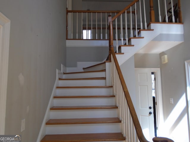 stairs with a towering ceiling