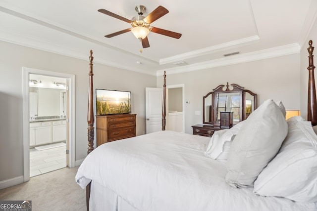 bedroom with a ceiling fan, visible vents, crown molding, a raised ceiling, and light colored carpet