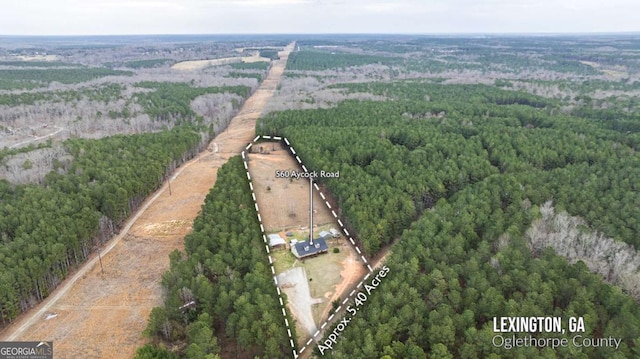 bird's eye view with a rural view and a forest view