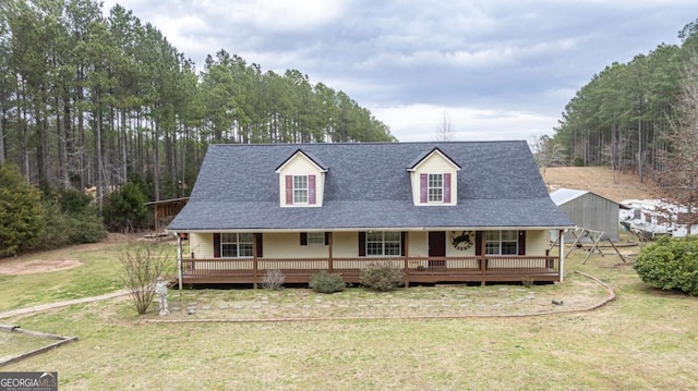 view of front facade with a porch and a front lawn