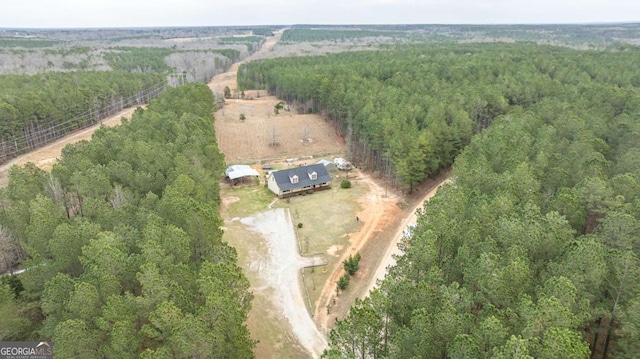 bird's eye view featuring a rural view and a forest view