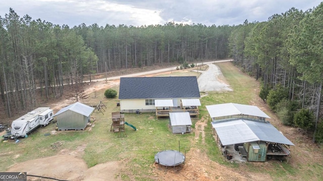 aerial view featuring a view of trees