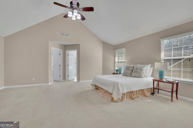 carpeted bedroom with visible vents, ceiling fan, high vaulted ceiling, and baseboards