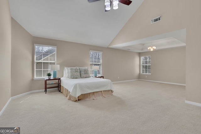 bedroom with visible vents, multiple windows, baseboards, and carpet floors