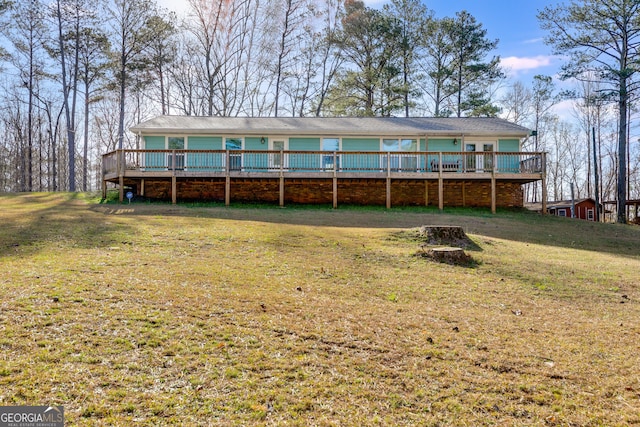4864 Yeagar Rd, Douglasville, GA 30135 - rear view of house with a yard and a wooden deck