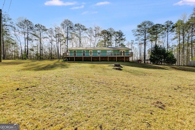 4864 Yeagar Rd, Douglasville, GA 30135 - view of yard with a deck