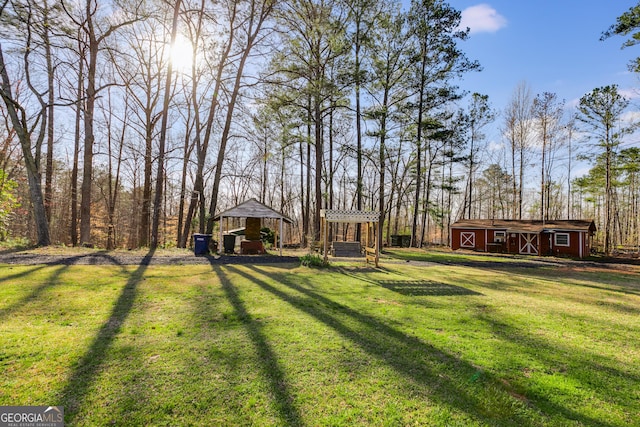 4864 Yeagar Rd, Douglasville, GA 30135 - view of yard featuring an outdoor structure and a barn