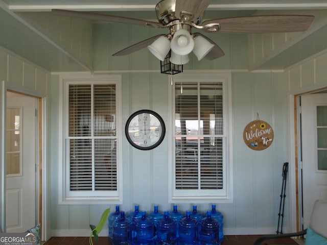 exterior space with a ceiling fan