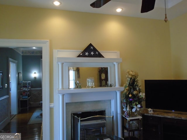 living room featuring recessed lighting, wood finished floors, ceiling fan, and a fireplace