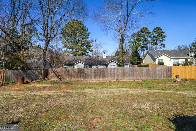 view of yard with fence