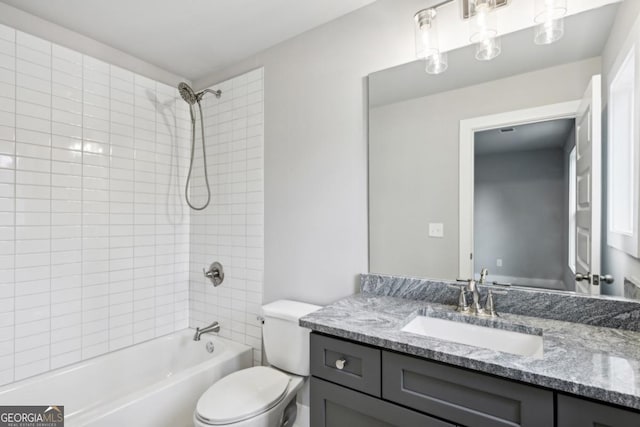 3143 Stonegate Dr SW, Atlanta, GA 30331 - bathroom featuring toilet, vanity, and shower / bathtub combination