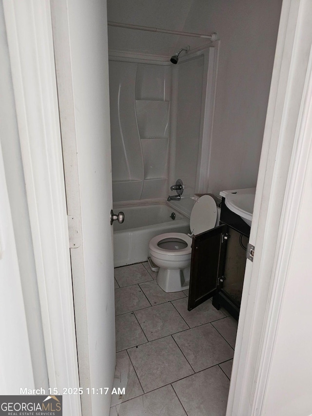 11187 Shannon Cir, Hampton, GA 30228 - bathroom with vanity, tile patterned floors, toilet, and shower / tub combination