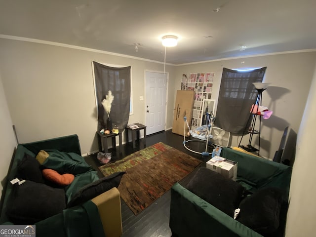 living room featuring wood finished floors and ornamental molding