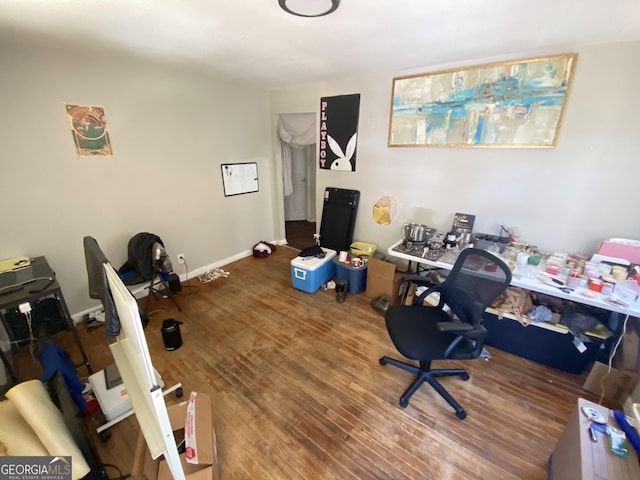 office with wood finished floors and baseboards