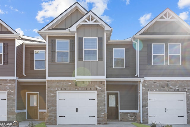 227 Ivey Ter Unit 36, Temple, GA 30179 - townhome / multi-family property featuring board and batten siding, a garage, and brick siding