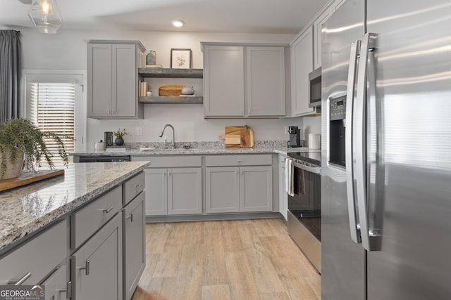 227 Ivey Ter Unit 36, Temple, GA 30179 - kitchen featuring appliances with stainless steel finishes, gray cabinets, open shelves, light wood-style flooring, and recessed lighting