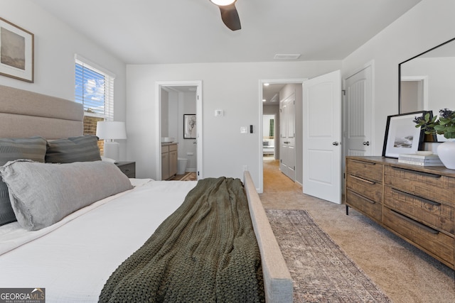 227 Ivey Ter Unit 36, Temple, GA 30179 - bedroom with light carpet, ensuite bath, and a ceiling fan