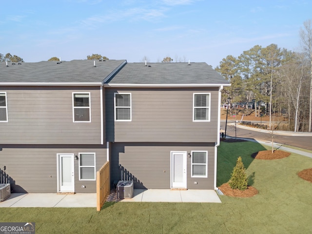 227 Ivey Ter Unit 36, Temple, GA 30179 - back of house with a patio area, a yard, and a shingled roof