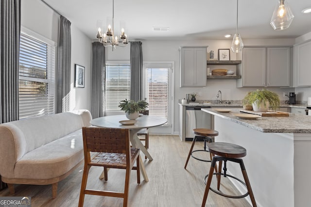 227 Ivey Ter Unit 36, Temple, GA 30179 - kitchen with stainless steel dishwasher, gray cabinets, plenty of natural light, light wood-style floors, and recessed lighting