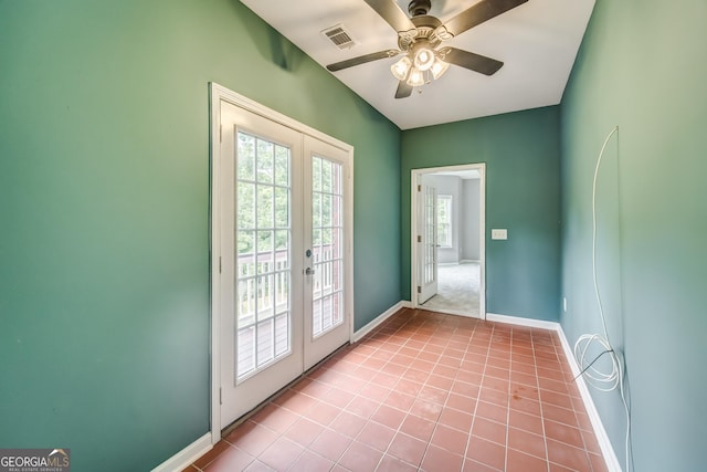 doorway to outside with a ceiling fan, french doors, baseboards, tile patterned flooring, and visible vents