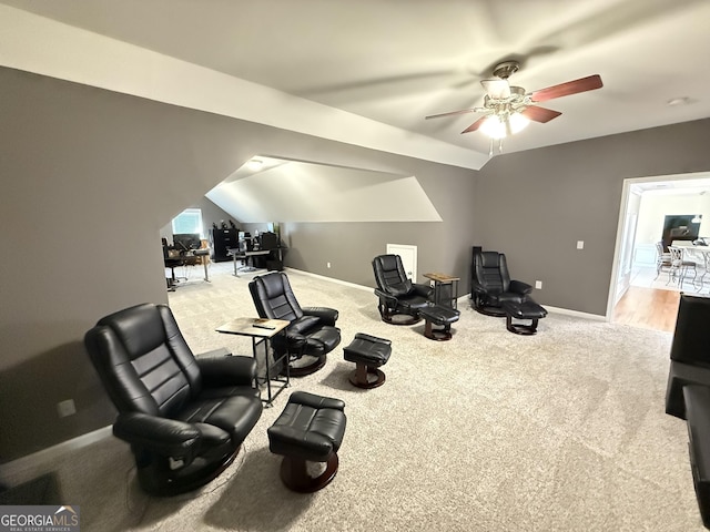 interior space featuring carpet floors, baseboards, and ceiling fan