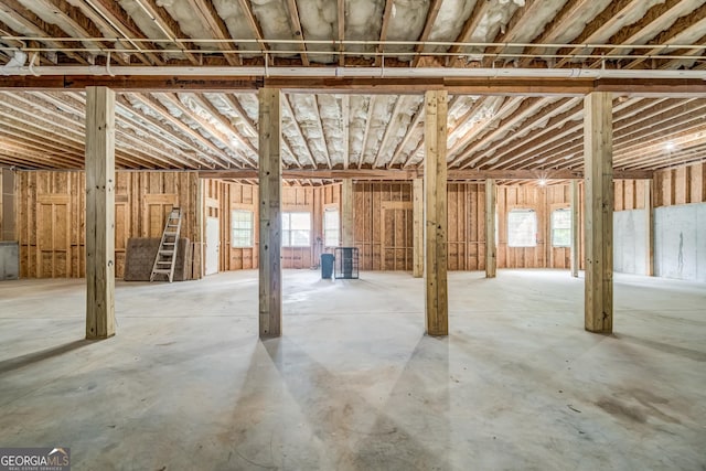 basement with stairway and a healthy amount of sunlight