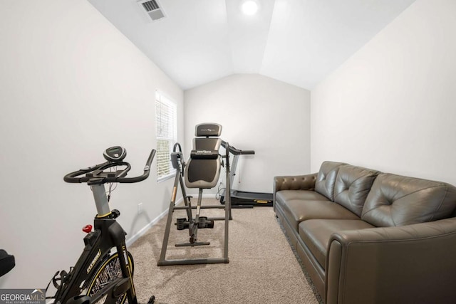 workout area with visible vents, lofted ceiling, carpet, and baseboards