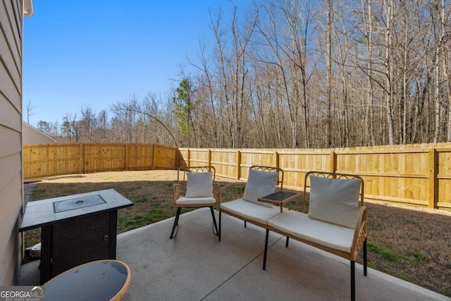 view of patio with a fenced backyard