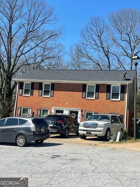 view of front of property with brick siding