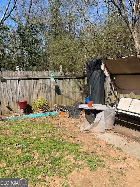 view of yard featuring fence