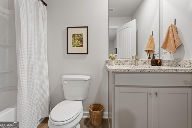 233 Ivey Ter Unit 39, Temple, GA 30179 - bathroom featuring vanity, baseboards, toilet, and wood finished floors